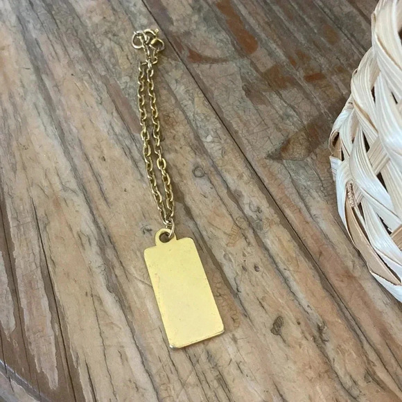 Yves Saint Laurent - Authentic YSL Parfums zipper pull gold color on short chain - Picture 3 of 4